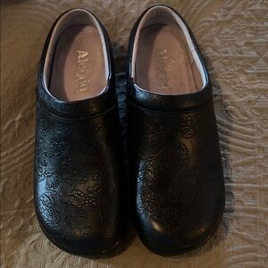 Alegria Black Embossed Floral Clogs